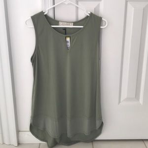 Women’s New Sinuous green top. New with tags.